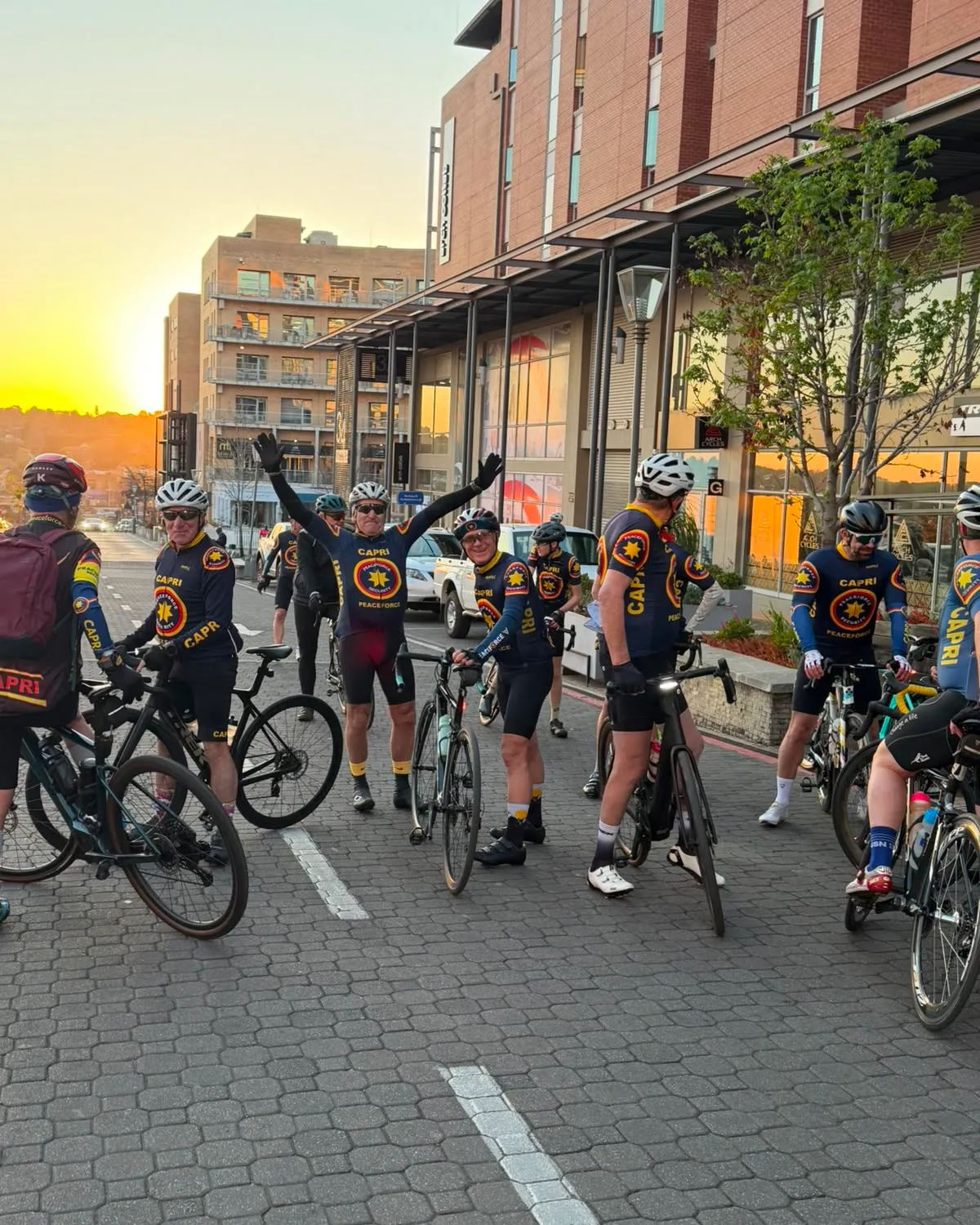 Riders of the cycling community gathered with their bicycles at sunrise, before a Sunday ride